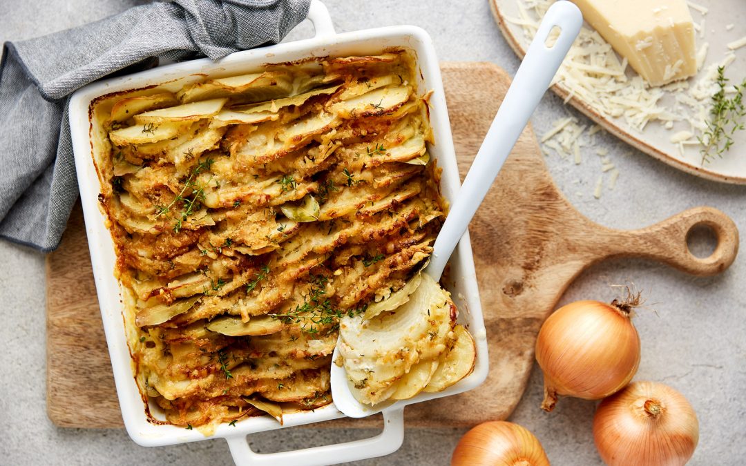 Cheesy onion and potato tray bake