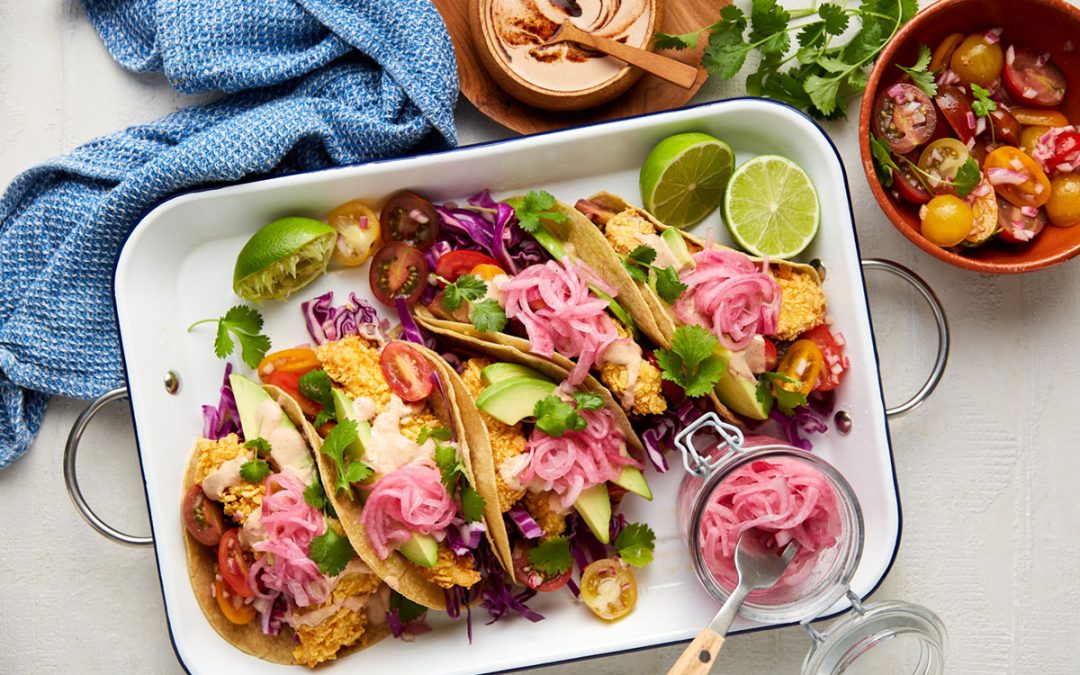 Cornflake crumb fish tacos with quick red onion pickle