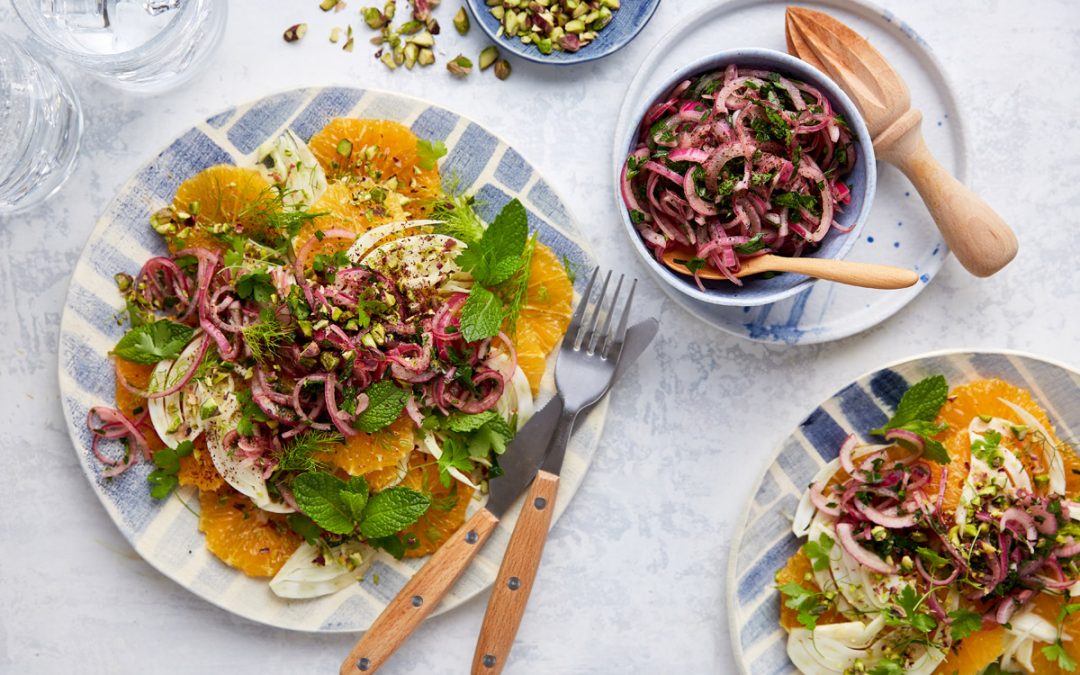 Citrus salad with quick red onion pickles, mint and pistachio nuts